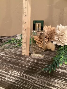 Avon Clear Glass Perfume Bottle with Gold Atomizer and Cream Faux Flowers
